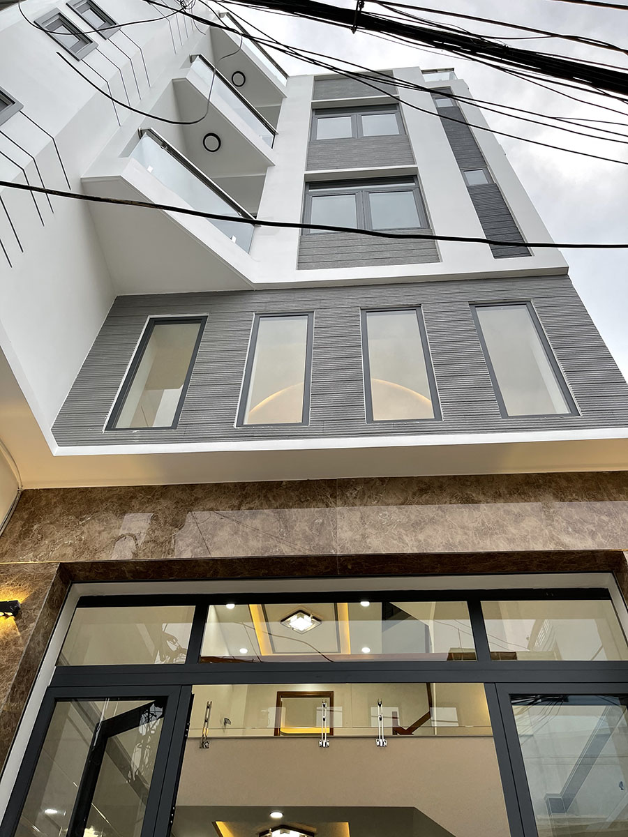 Bán nhà Nơ Trang Long, Quận Bình Thạnh Tuyệt phẩm 4 lầu (4,2m x 14m) tk Singapore ôtô đổ trong nhà.